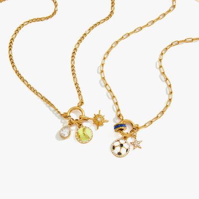 Fine chains hung with a star, a football and coloured stone charms