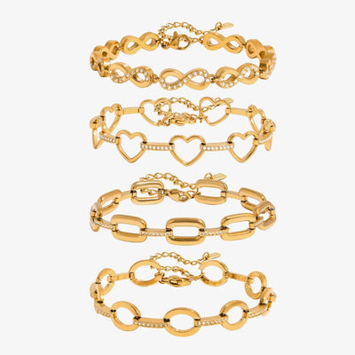 Four gold-tone bracelets: infinity, open heart, paperclip and oval links