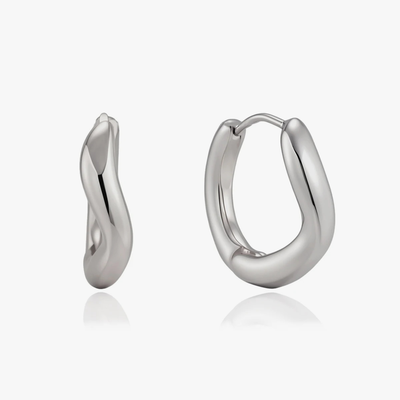 Chunky silver-tone huggie hoops, one twisted and one smooth