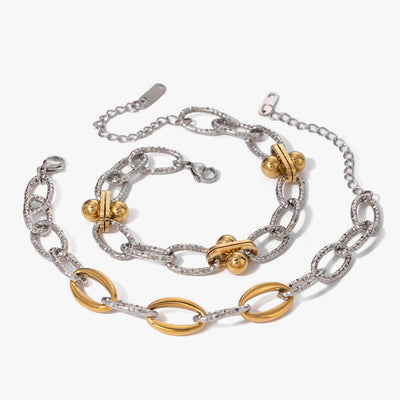 Two-tone oval-link chain bracelets in gold and silver
