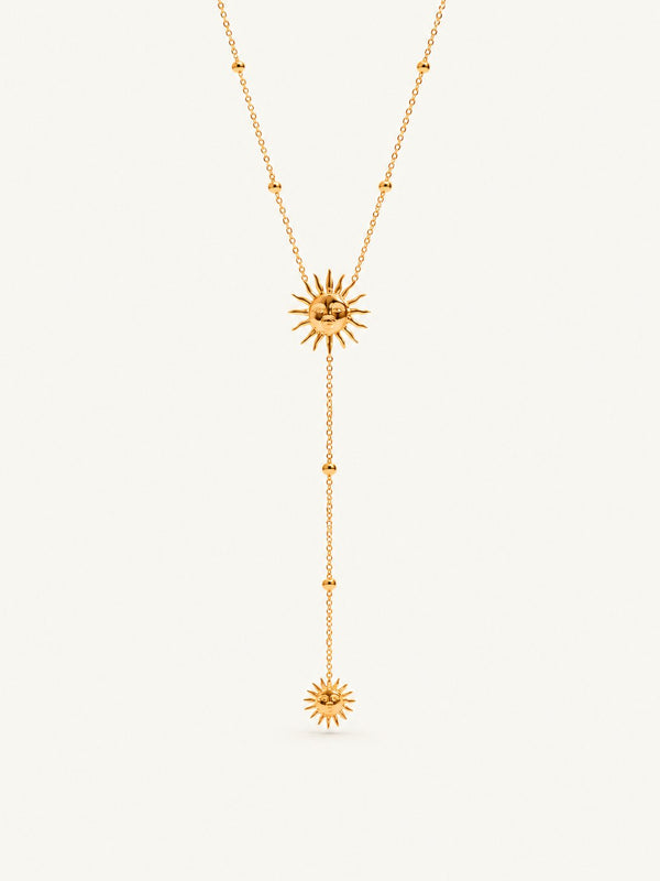 Y-shaped chain with a sun motif at the neck and a smaller sun drop
