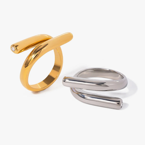 Open bar rings that wrap the finger, in gold tone and silver tone