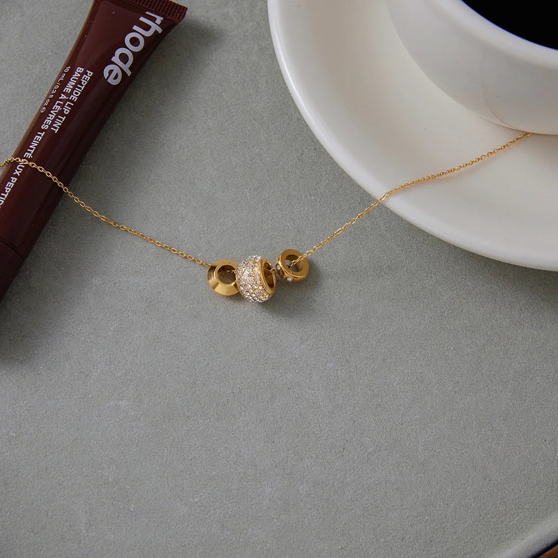 Close view of the pave crystal beads along the fine chain