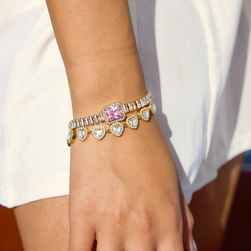 Cecile Crystal Tennis and Halo Heart Bracelet worn, pink stone at the centre