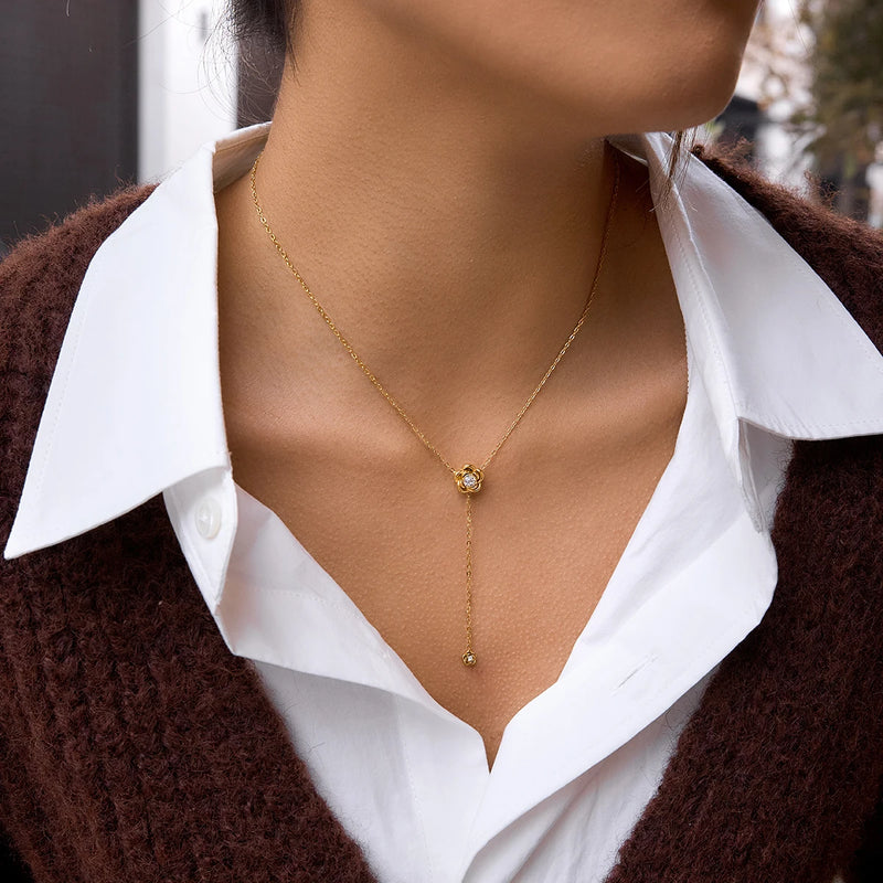 Angele Crystal Lariat Necklace worn alone over an open collar