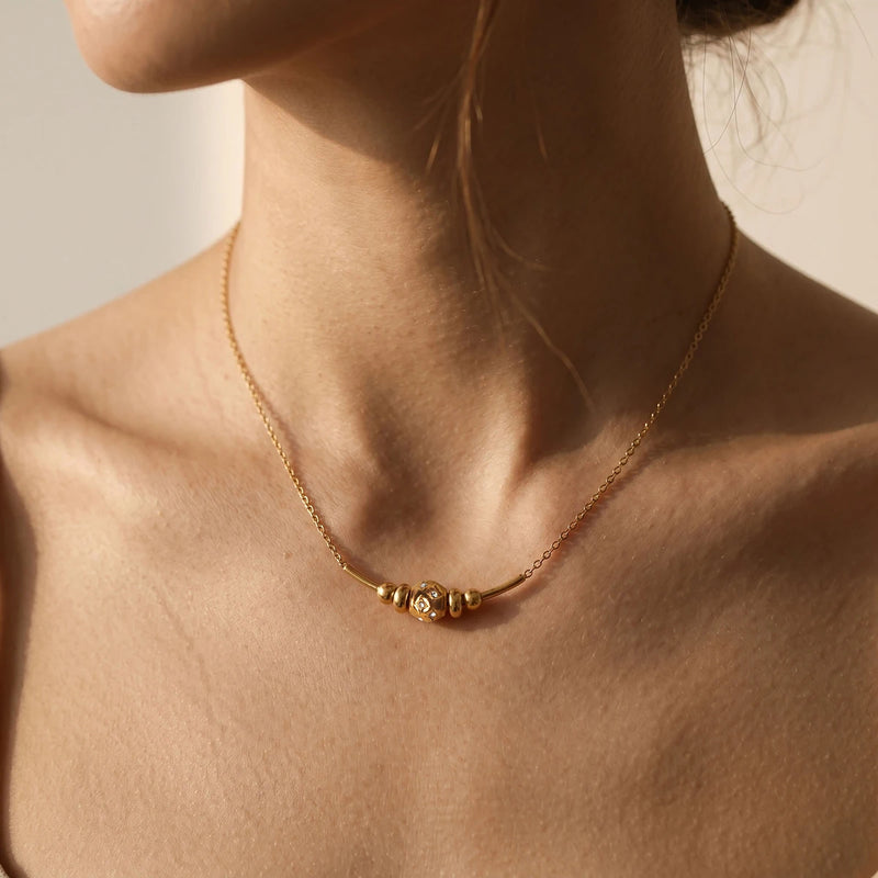 Close view of the beaded section of the chain worn at the neck