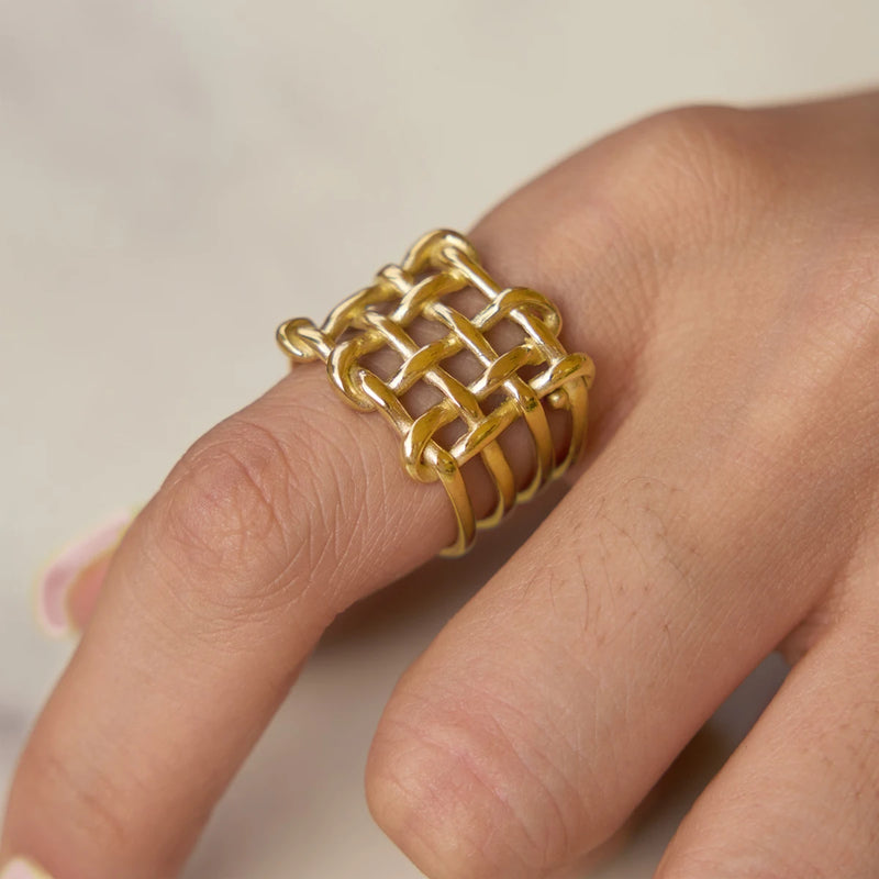 Close view of the open basketweave band worn on a hand