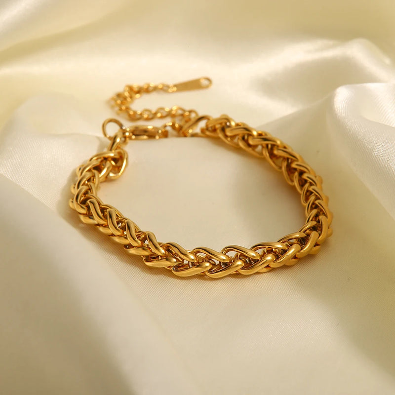 Wheat chain bracelet with an extender, on cream satin