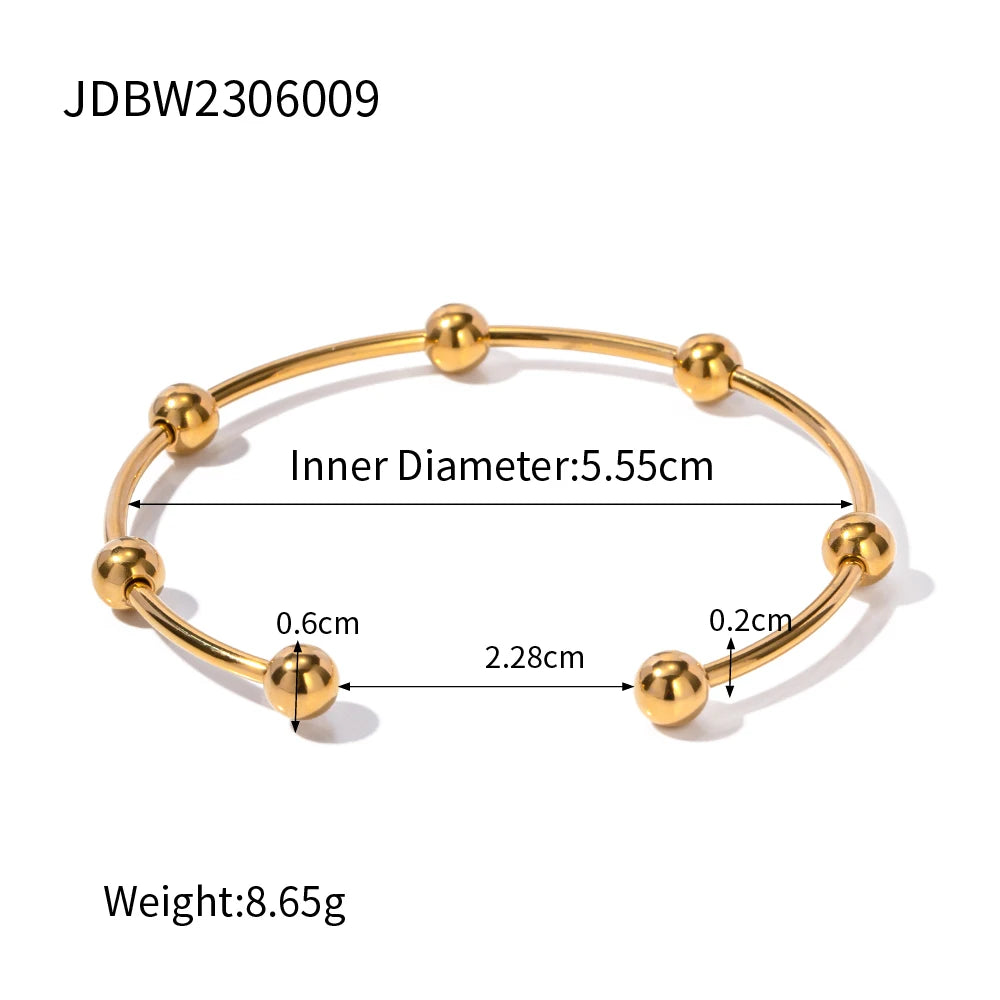 MACAJE Plume Bangle Light Yellow Gold