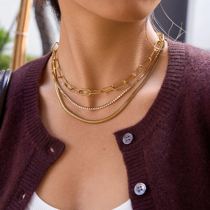Marielle Triple-Layer Chain Necklace worn over a cardigan