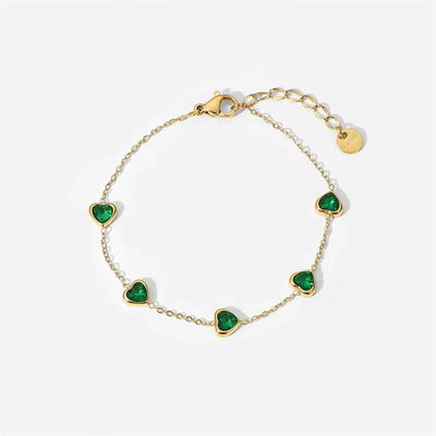 Fine chain bracelet set with small green heart-cut stones