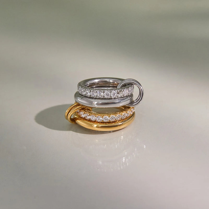 Louise Interlocking Double Band Ring, gold-tone and silver-tone side by side