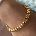Cherie Twisted Cuff Bangle worn on the wrist – Macaje