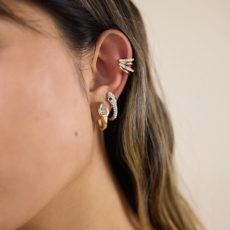 Crystal-set hoop worn with a second hoop and an ear cuff