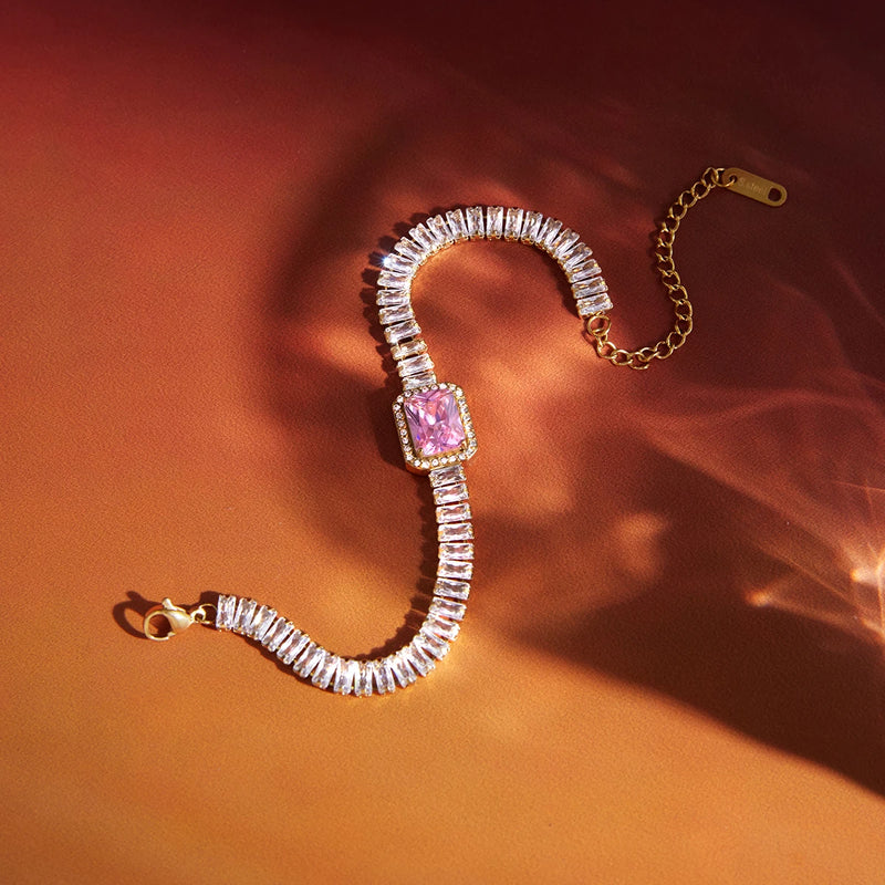 Cecile Crystal Tennis and Halo Heart Bracelet laid out with clasp and extender chain