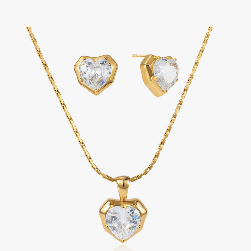 Heart-shaped crystal stud earrings with a matching pendant necklace