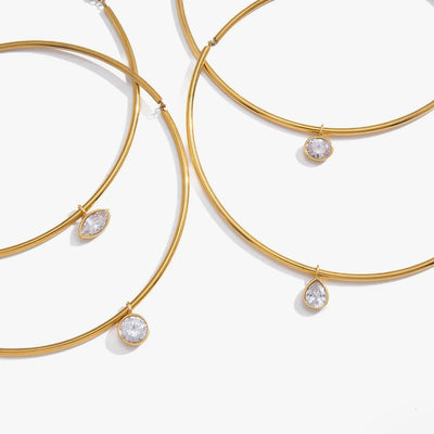 Slim collar necklaces with small bezel-set crystal drops