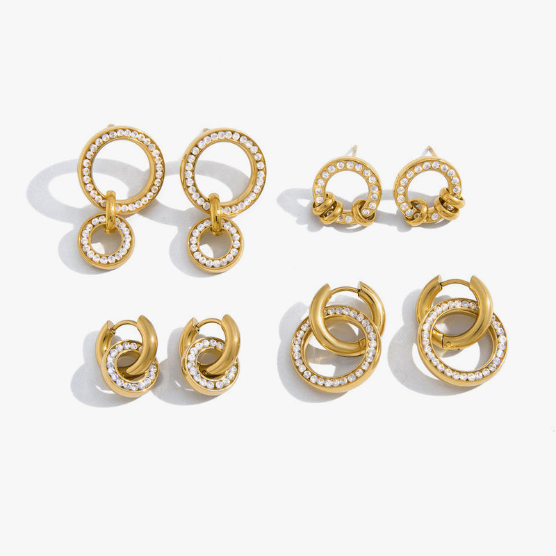 Four pairs of interlocking circle earrings with crystal-set rings