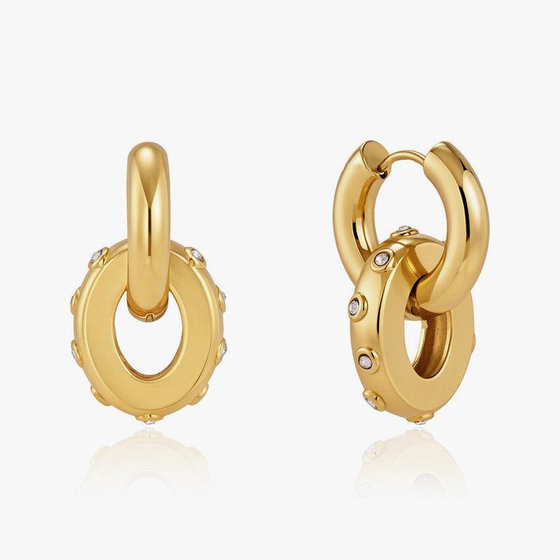 Chunky huggie hoops with an oval link drop
