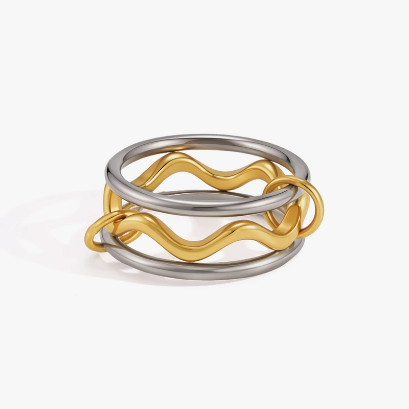 Stacked wavy rings in gold tone and silver tone