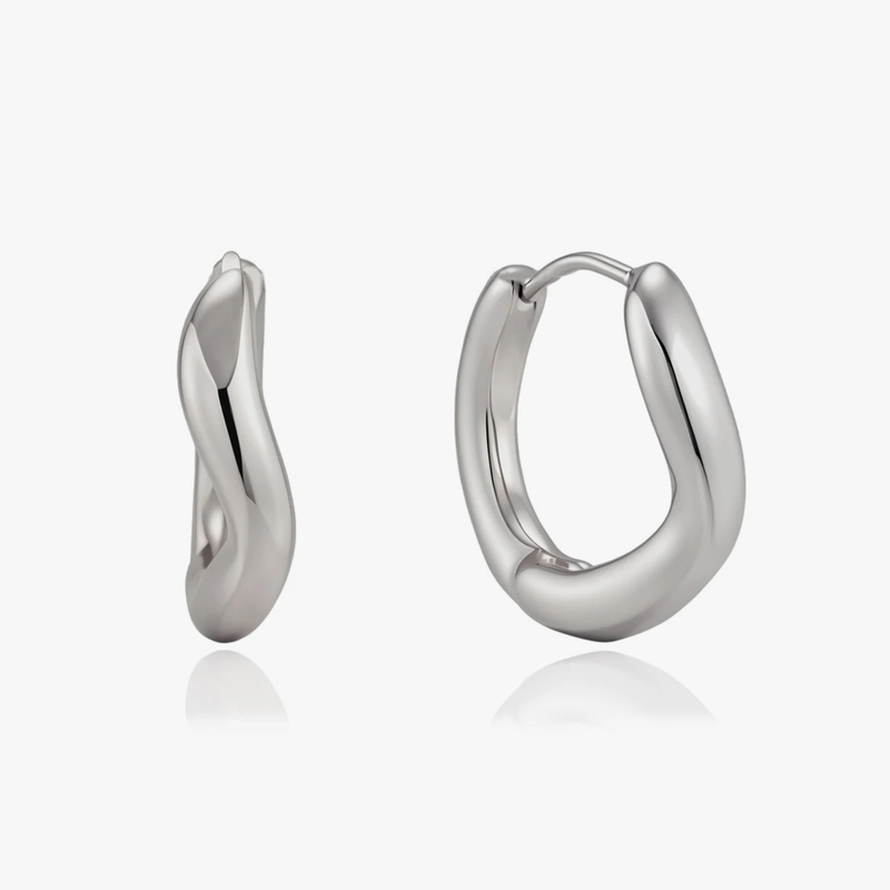 Chunky silver-tone huggie hoops, one twisted and one smooth