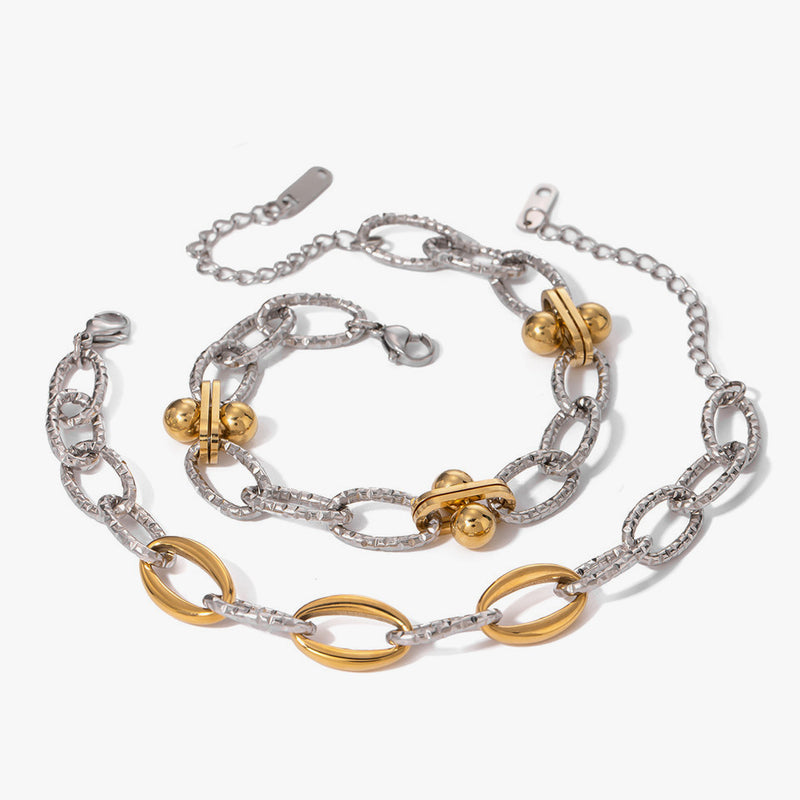 Two-tone oval-link chain bracelets in gold and silver
