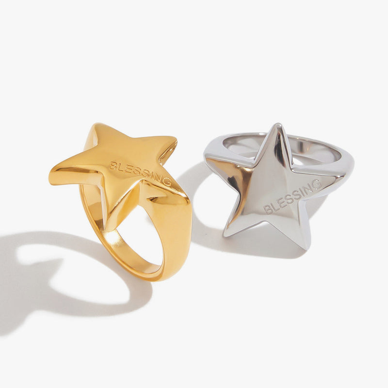 Chunky star-topped rings in gold tone and silver tone