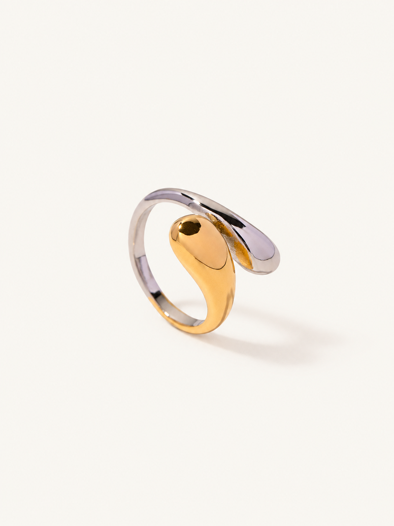 Swirled wrap ring blending gold tone and silver tone