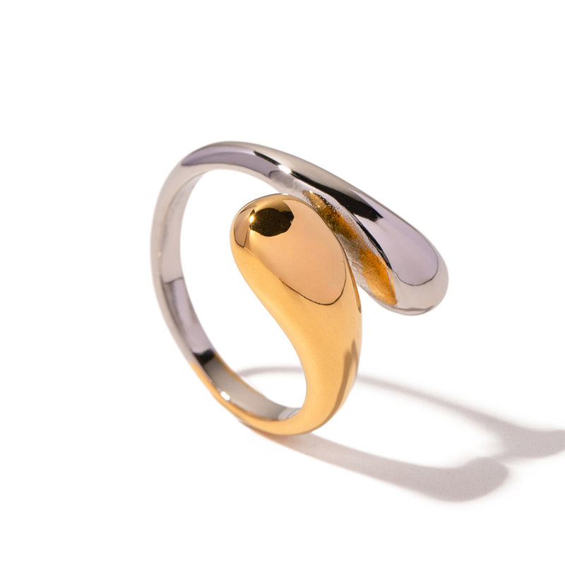 Swirled wrap ring blending gold tone and silver tone
