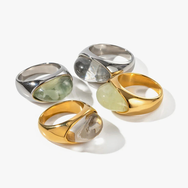 Chunky domed rings set with pale green and grey cabochon stones