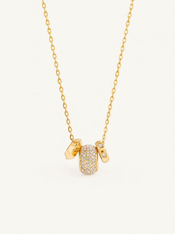 Fine chain with a crystal-set barrel bead and two small charms