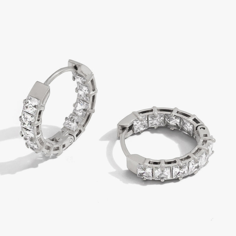 Silver-tone huggie hoops set all round with baguette crystals