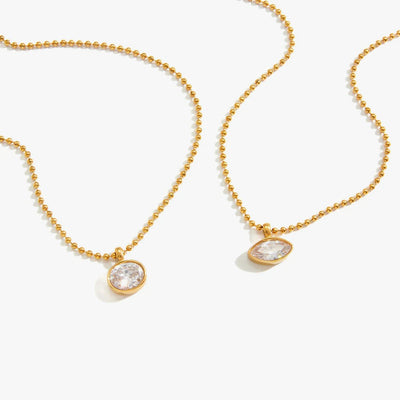 Beaded chains each with a single bezel-set crystal drop