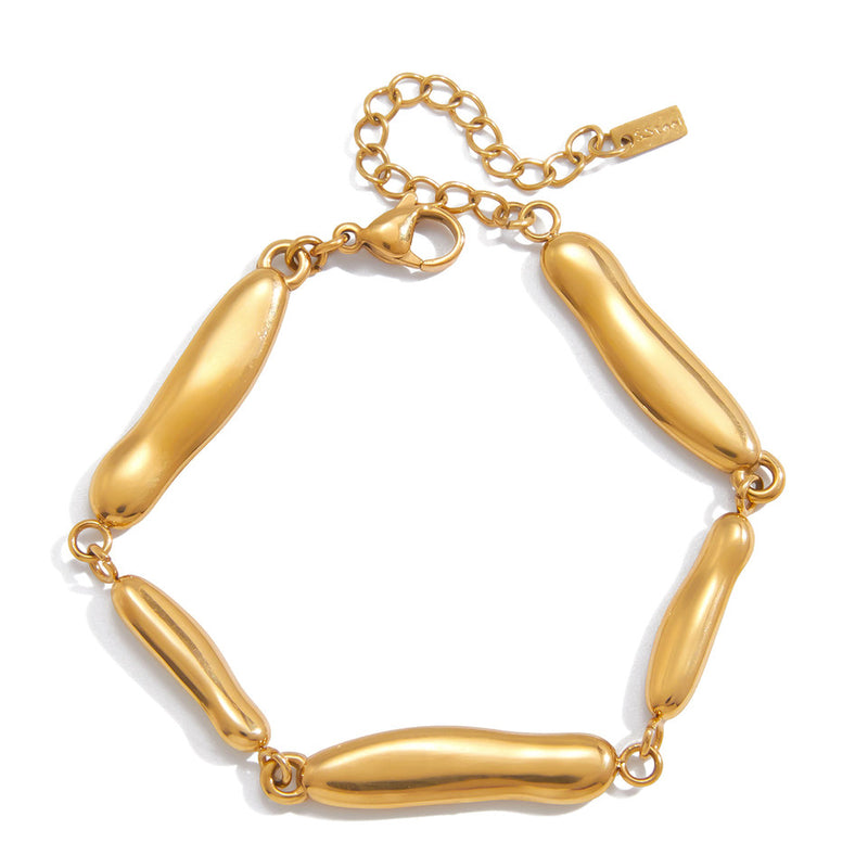 Bracelet built from smooth elongated gold-tone pebble links