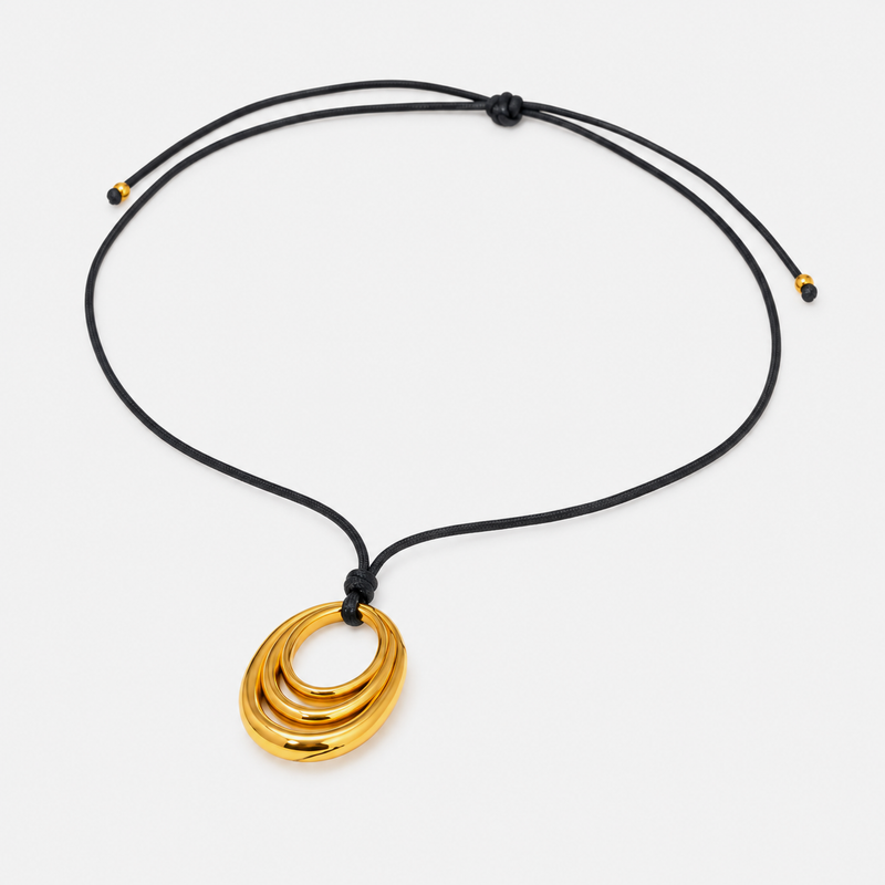 Renee Sculptural Pendant Cord Necklace — Swirl Knot Gold