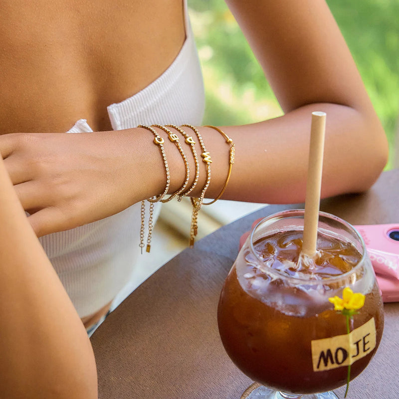 Pauline Initial Crystal Tennis Bracelet worn stacked on the wrist